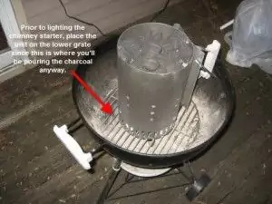 Place chimney starter on lower grate of grill