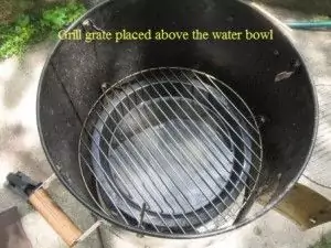 Grill grate placed above the water bowl