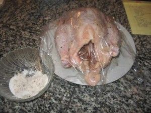 Chicken after rubbing with salt and pepper