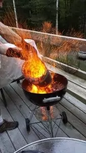 Dumping burning charcoal into my Weber One Touch Grill